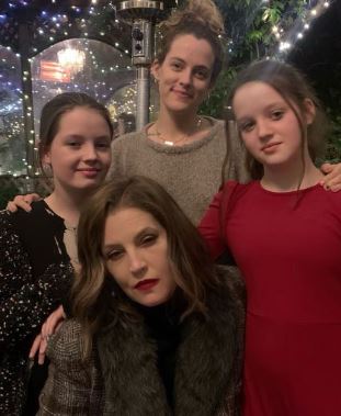 Finley Aaron Love Lockwood with her mother Lisa Marie Presley and sisters